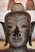 Vientiane, Laos - Wat Si Saket, The gallery around the sim houses thousands of Buddha statues in various mudras, dating  from the 16th century. 